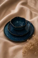 Indigo Bloom Set handmade blue ceramic dinnerware set with large plate, side plate, and sculpted artisan bowl